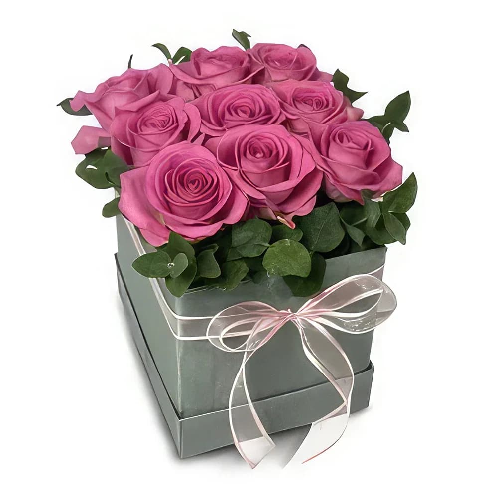 Boîte de présentation élégante de roses roses
